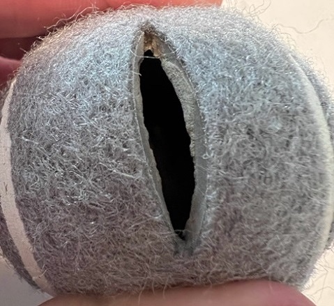 Gray new precut tennis balls for school chair legs